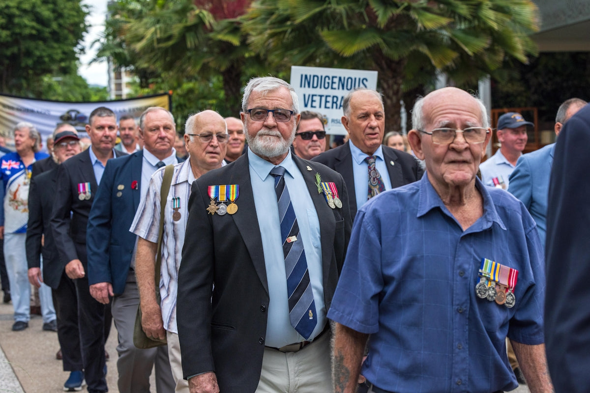 Veterans march together in solidarity.