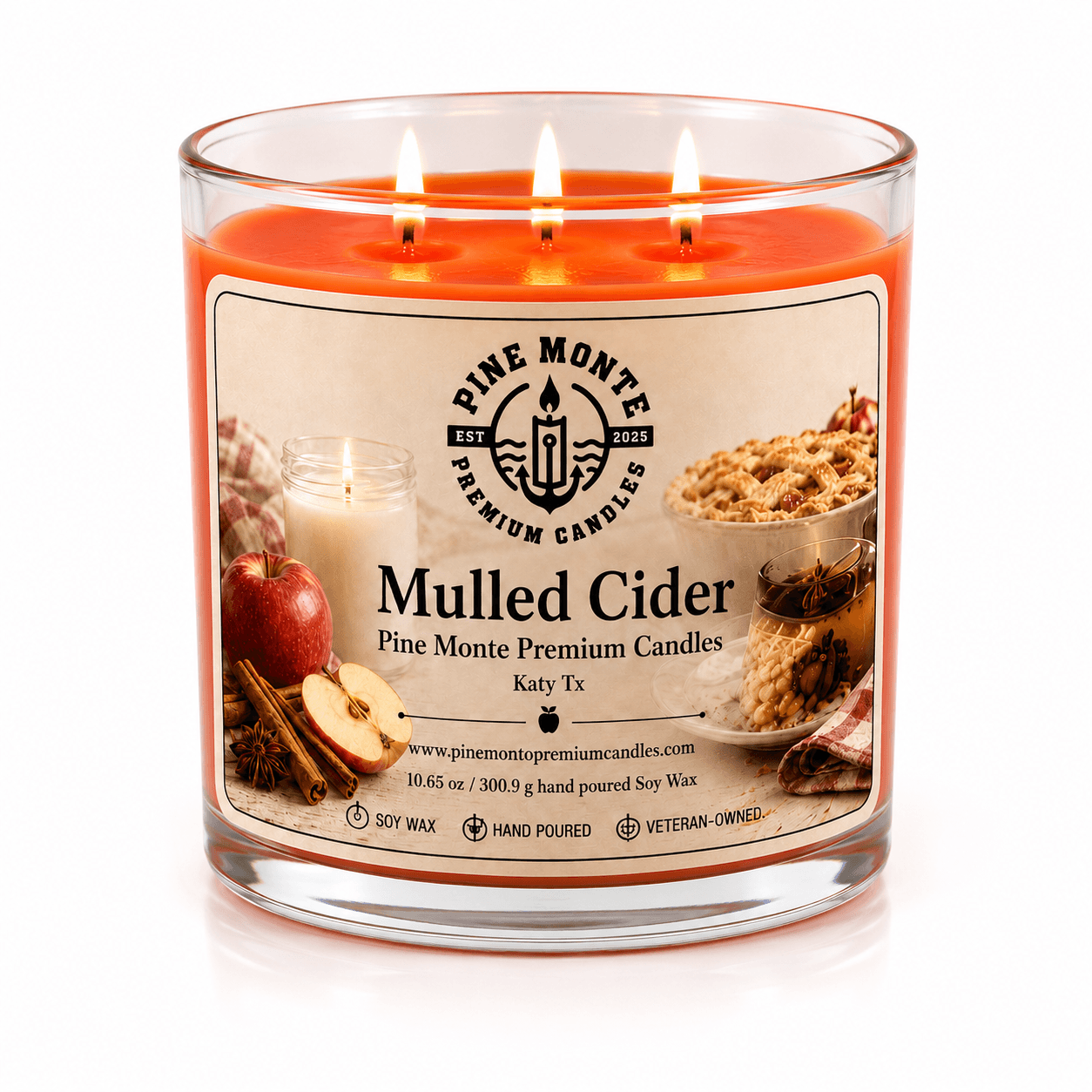 Mulled Cider Soy Candle featuring a premium artisan design, with notes of apple and baking spices in a clear glass jar.