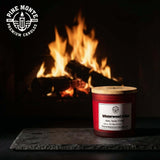 winterwood ember soy candle reimagining the hearth with warm glowing woods and ember scent