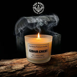 Cedar Chest 3 Wick Soy Candle, a premium candle with cedarwood scent, surrounded by smoke and a vintage trunk.